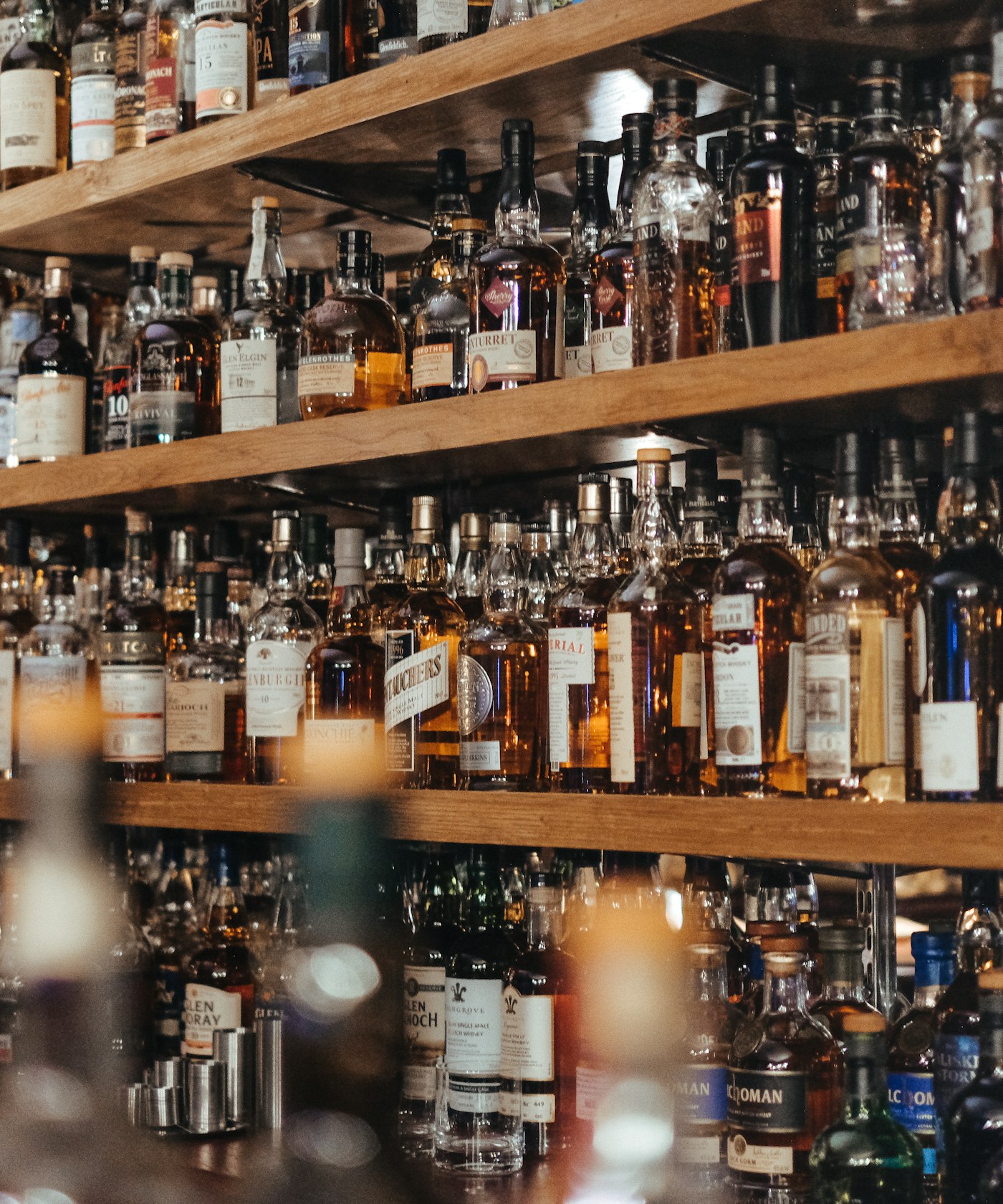Craft distillery — copper pot still and oak barrels